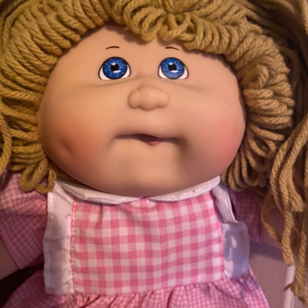 Vintage anniversary 2012 girl Cabbage Patch doll. She is excellent shape!